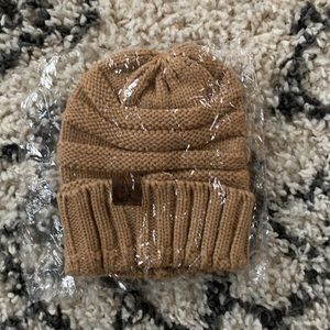 CC Beanie, new with tags, in bag, tan